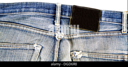 Blank leather jeans label on a old used jeans Stock Photo