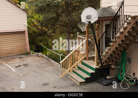 View looking down into the side yard of a home in a working class neighborhood in a small New England city. Stock Photo