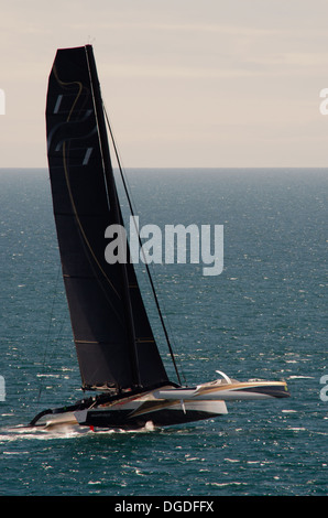 Racing yacht taking part in Fastnet race at Cowes Week Isle of  White Stock Photo