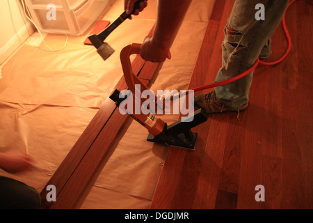 Solid hardwood floor installation Stock Photo