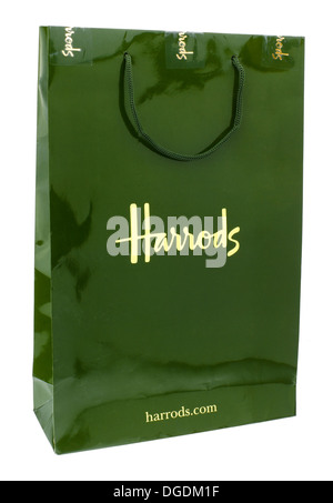A Harrods shopping bag being carried by a shopper Stock Photo - Alamy