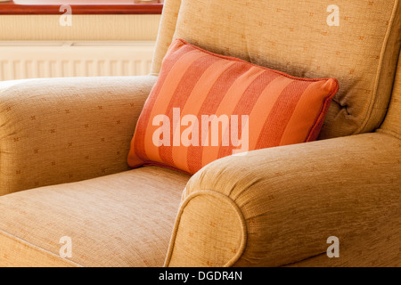 comfortable arm chair in a room Stock Photo