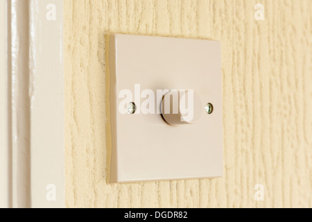 Electric light switch on wall Stock Photo