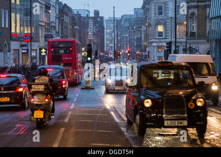 Busy London traffic at dusk in Winter Stock Photo