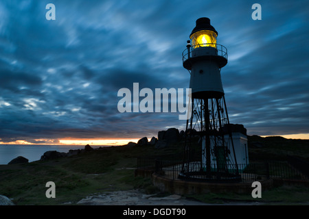 Sunset over Peninnis Head Lighthouse, St Mary's, Isles of Scilly, UK Stock Photo
