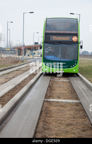 The Cambridgeshire Guided Busway, known locally as The Busway, connects Cambridge, Huntingdon and St Ives in the English county of Cambridgeshire. Stock Photo