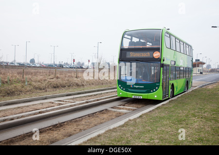 The Cambridgeshire Guided Busway, known locally as The Busway, connects Cambridge, Huntingdon and St Ives in the English county of Cambridgeshire. Stock Photo