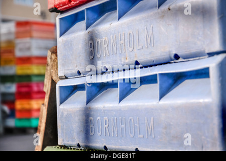 Colorful boxes for fish in the harbor of Svaneke on Bornholm, Denmark Stock Photo