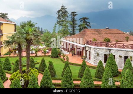 The Victoria Sapa Resort and Spa exterior and gardens in Sapa, Vietnam, Asia. Stock Photo