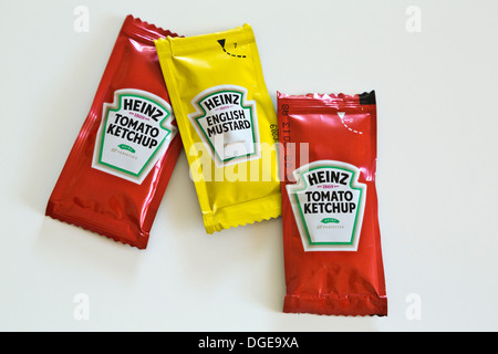 Sachets of Heinz tomato ketchup and English mustard sauce Stock Photo