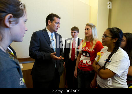 San Antonio, Texas. 19th Oct, 2013. U.S. Sen Ted Cruz of Texas greets attendees and young people before a speech to the Texas Federation of Republican Women (TFRW).  Cruz is making waves in Washington as a freshman Senator and Tea Party favorite challenging the Republican establishment. © Bob Daemmrich/Alamy Live News Stock Photo