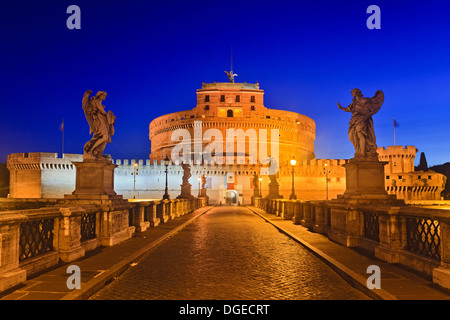 Italy Rome ancient landmark ruins of old roman castle St Angelo modern Christian church bridge with statues leading to the castl Stock Photo