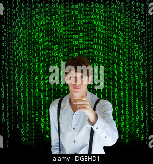 Businessman or teacher with binary on blackboard background Stock Photo