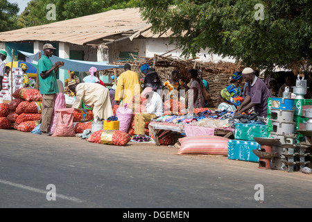 Weekly Market at Fass Njaga Choi, North Bank Region, The Gambia. Bags of Onions. Stock Photo