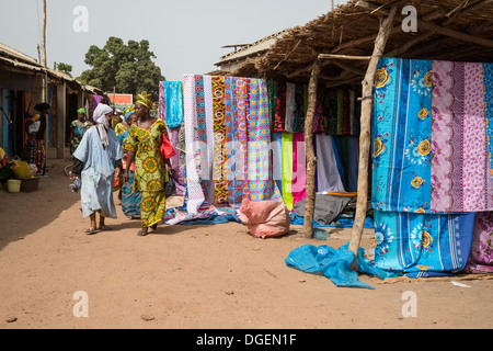 Weekly Market at Fass Njaga Choi, North Bank Region, The Gambia. Fabric for Sale. Stock Photo