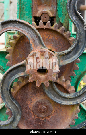 Rusty cogs on an old mangle, Northamptonshire, UK Stock Photo