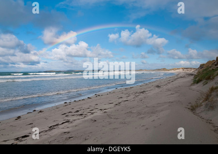 A Rainbow over Traigh lar, Malacleit, North Uist in the Outer Hebrides, Scotland Stock Photo