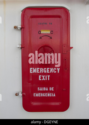 emergency exit door fire proof on the deck of a vessel. Stock Photo