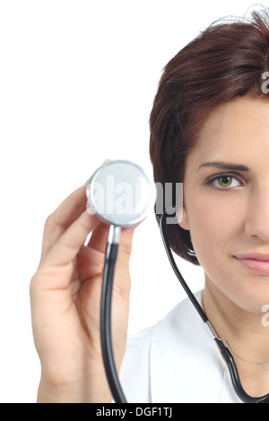 Beautiful doctor woman holding a stethoscope ready to auscultate isolated on a white background Stock Photo