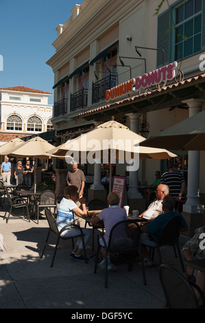 Seniors sitting and enjoying Dunkin Donuts in The Villages, Florida USA. A 55 and above adult retirement community. Stock Photo