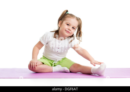 Kid girl doing fitness exercises Stock Photo