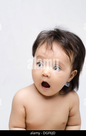 Baby surprised six-months-old Stock Photo