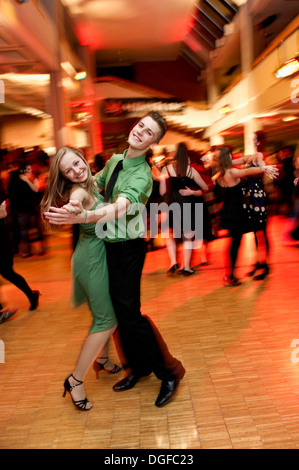 Young couple dancing at the prom of a dance school, Germany Stock Photo