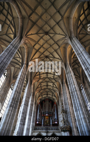 Vaulted ceiling and organ on the gallery of the late-gothic three-naved hall church, St. George's Minster, 1499, Dinkelsbühl Stock Photo