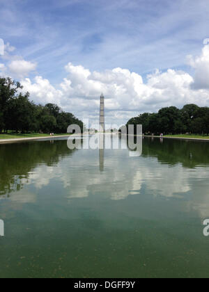 Washington, DC, USA. 14th July, 2013. Washington Monument from the western edge of the Reflecting pool showing the scaffolding in place, in Washington, DC, USA, 14 July 2013. The scaffolding is part of the repair and restoration work following the earthquake on August 23, 2011. Photo: Ron Sachs/dpa/Alamy Live News Stock Photo
