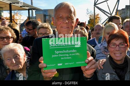 Leipzig, Germany. 19th Oct, 2013. Actor Rolf Becker (C) attends the fan festival of the ARD television series 'In aller Freundschaft' to mark its 15th anniversary in Leipzig, Germany, 19 October 2013. Photo: Hendrik Schmidt/dpa/Alamy Live News Stock Photo
