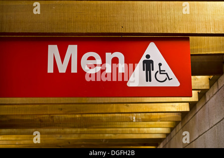 Men's public washroom toilet sign.   Bathroom sign for men and people with handicaps or disabilities. Stock Photo