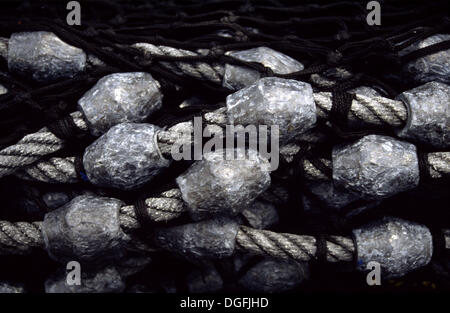 Fishing net weights Stock Photo - Alamy