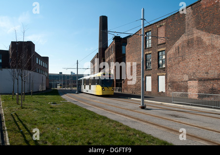 Metrolink tram on an off-street section of the East Manchester Line, near Piccadilly Station, Manchester, England, UK Stock Photo