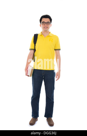 Young Asian student using pad PC isolated on white background. Stock Photo