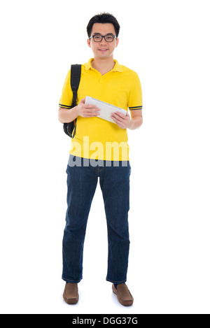 Young Asian student using pad PC isolated on white background. Stock Photo