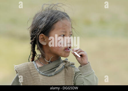 Tibetan girl, portrait, Friendship Highway between Lhatse and Tingri, Tibet, China, Asia Stock Photo