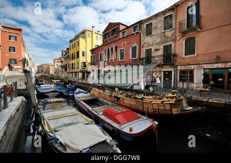 Boat with a fruit and vegetables stall, Rio de Sant'Ana, houses along a canal, Castello, Venice, Venezia, Veneto, Italy, Europe Stock Photo