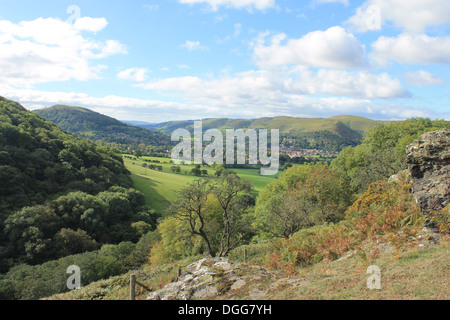 The Long Mynd and Church Stretton (background) and Ragleth Hill (left, middle ground) viewed from the ascent of Caer Caradoc Stock Photo