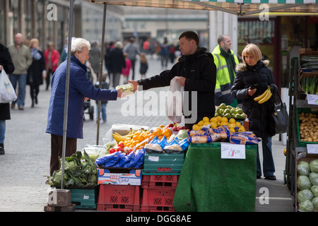 Fruit and vegetable market trader in Liverpool city centre Stock Photo