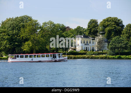 Alster river steamer on the Aussenalster or Outer Alster Lake, mansion at back, Hamburg, Hamburg, Germany Stock Photo