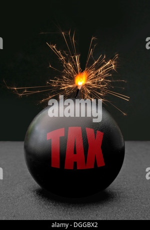Tax concept with the exploding bomb Stock Photo - Alamy