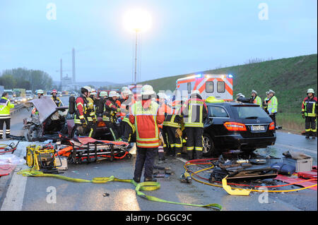 Fatal traffic accident on Autobahn, firefighters covering dead person ...