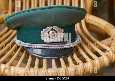 Officers hat from former GDR military for sale at the weekly flea market, Dresden, Saxony Stock Photo