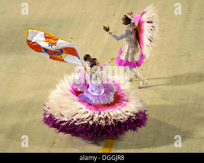 Couple dancing, Mestre Sala and Porta Bandeira, parade of the samba school Inocentes de Belford Rocho, Sambodromo Stock Photo