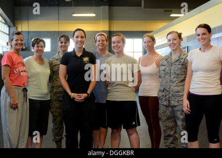 U.S. Air Force Airmen assigned to the 169th Fighter Wing at McEntire Joint National Guard Base, South Carolina Air National Guard, participate in a “females only” self-defense class provided by the Richland County Sherriff’s Department, Oct. 6, 2013.