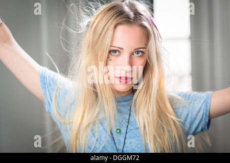 Young woman with windswept hair, portrait Stock Photo