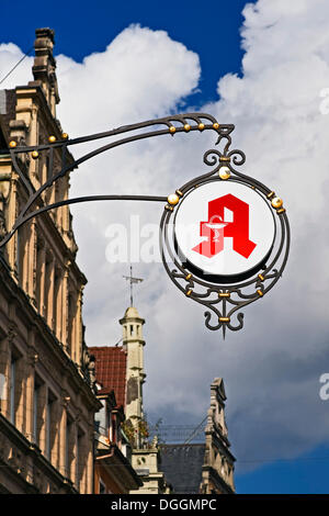 Old pharmacy sign with the official symbol for German pharmacies in Konstanz, Baden-Wuerttemberg Stock Photo