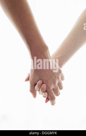 Man and woman holding hands, portrait Stock Photo