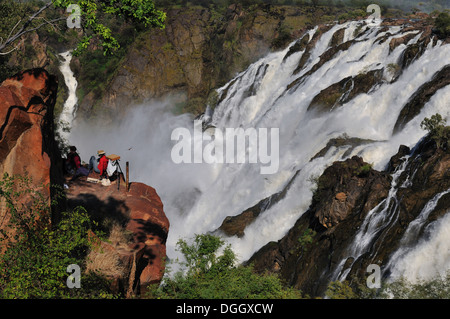 Artist at the Ruacana waterfalls on the boder between Angola and Namibia Stock Photo