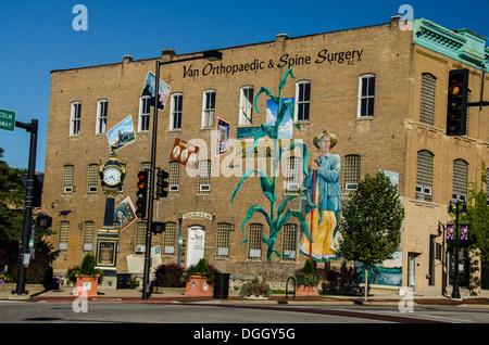 Soldiers and Sailors Memorial Clock and town mural in Memorial Park in DeKalb, Illinois, a town along the Lincoln Highway. Stock Photo